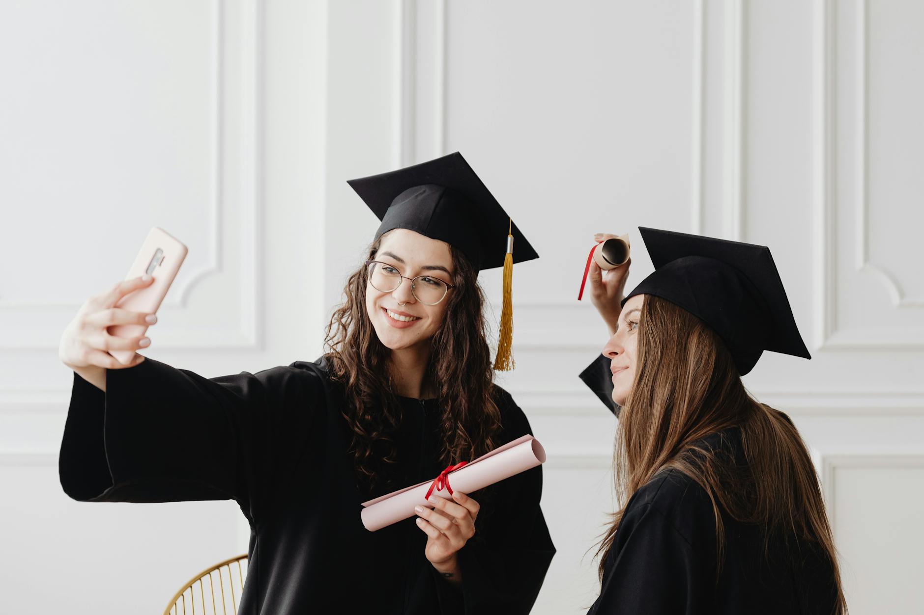 A college student graduating, supported by a 529 college savings plan