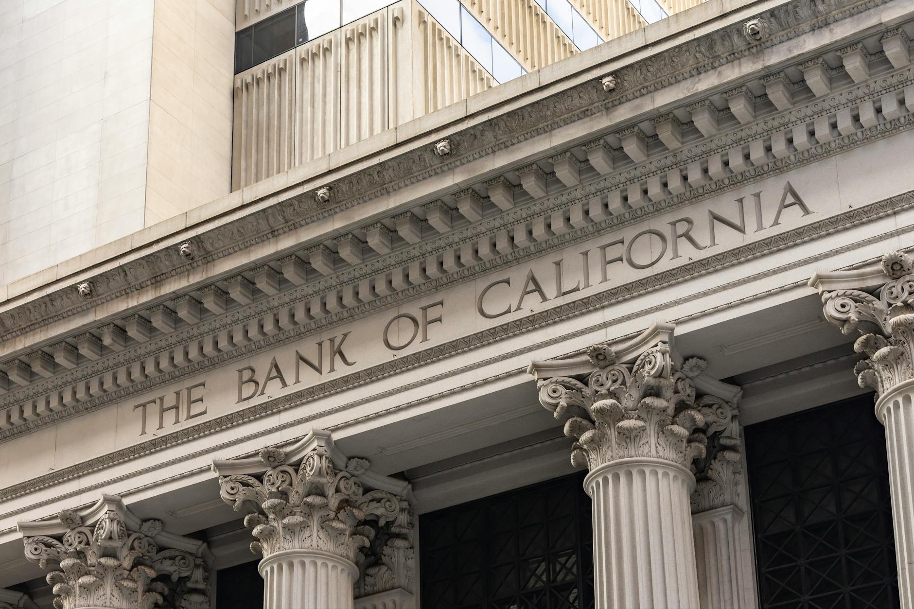 Classical bank building exterior with columns, illustrating how banks generate revenue from the deposit-loan spread