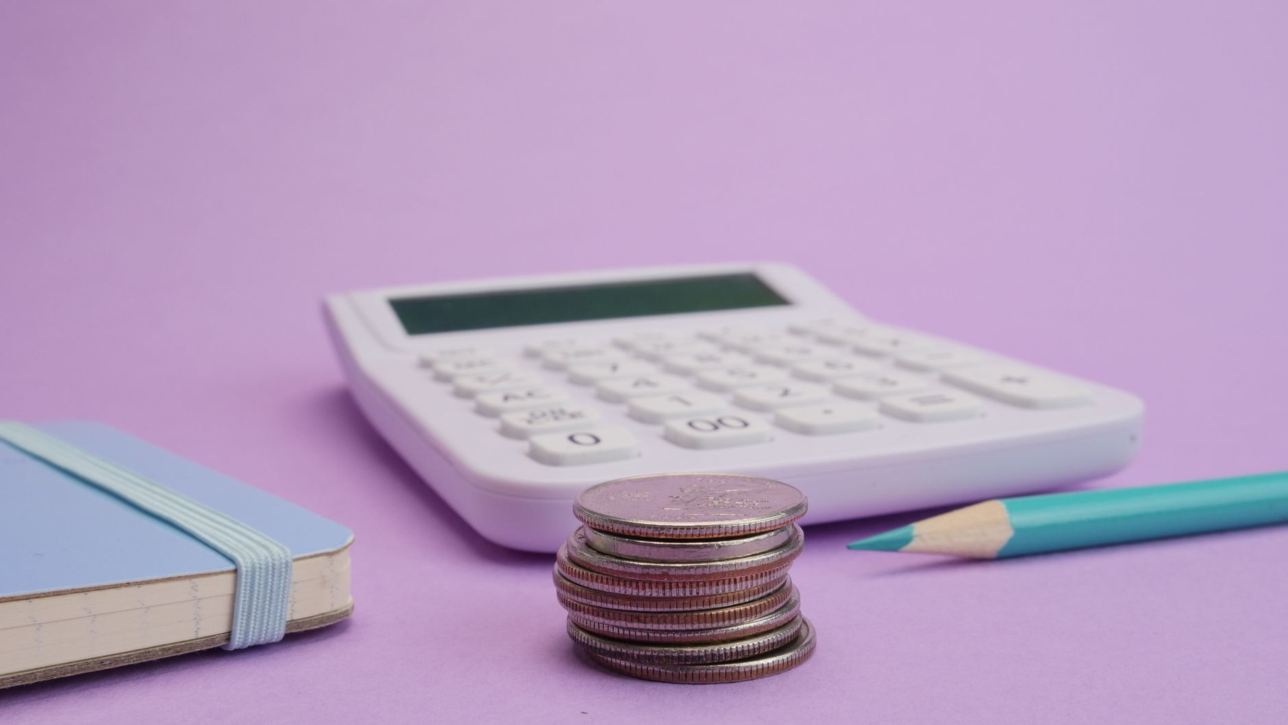 Retirement savings planning with documents and a calculator