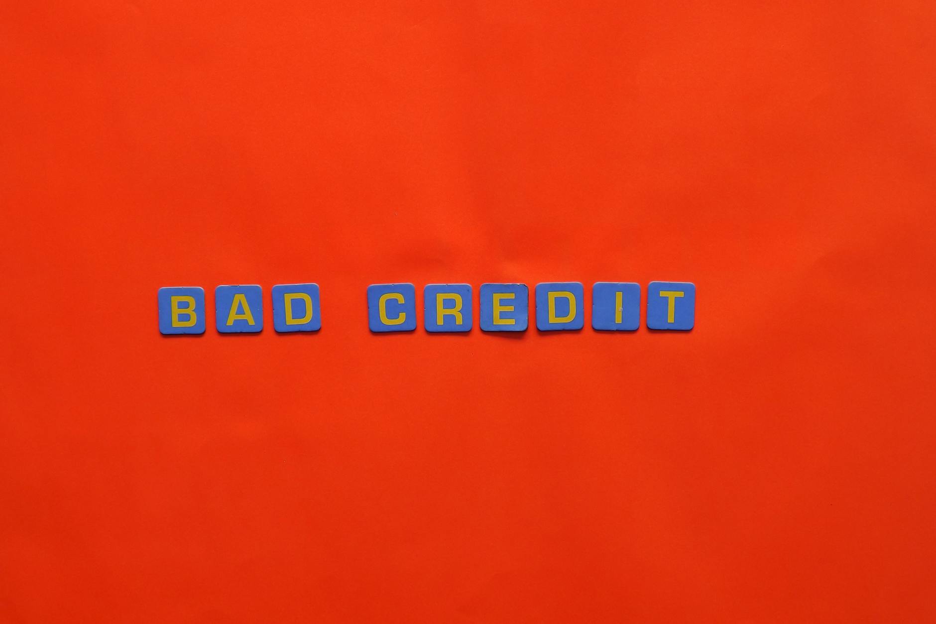A person reviewing financial paperwork, illustrating how a credit-builder loan helps build a credit score