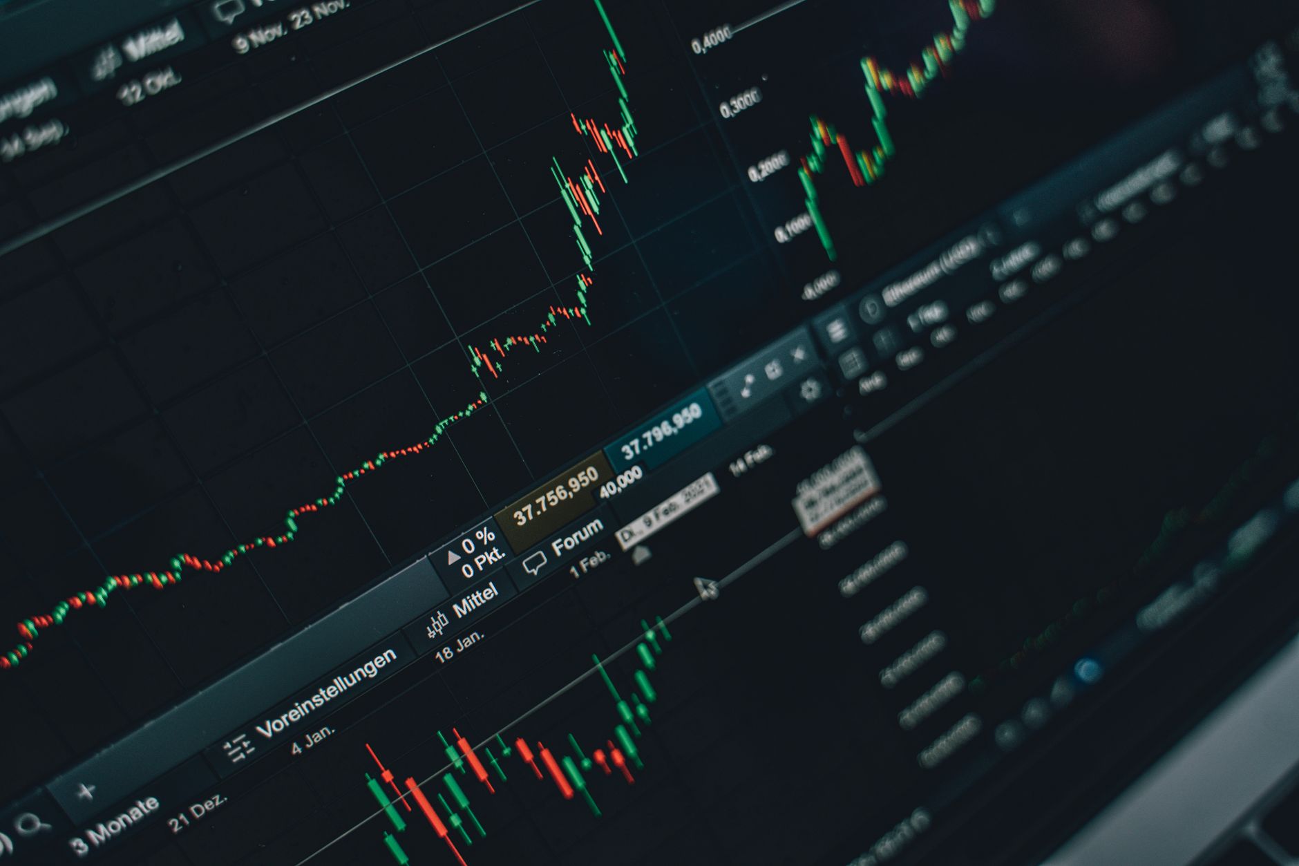 Investor reviewing stock market chart on a laptop