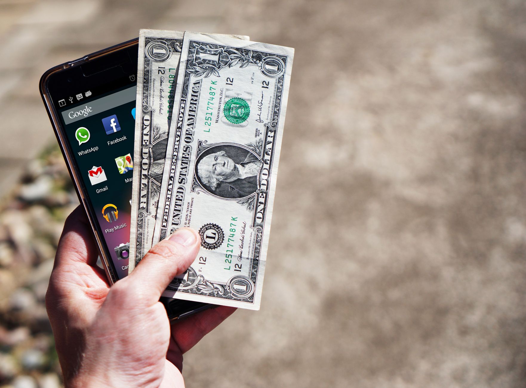 Person using a mobile banking app on a smartphone