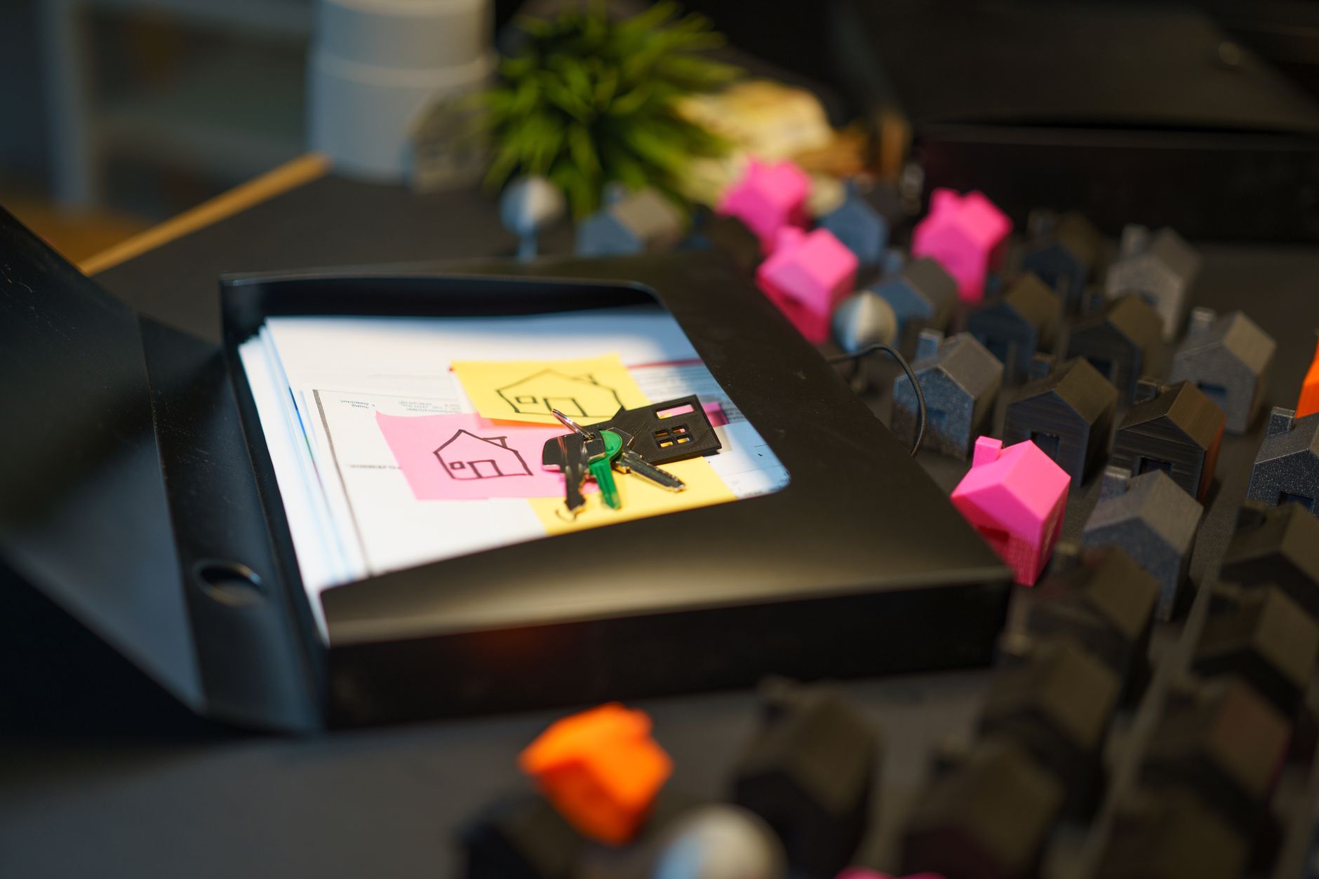House keys and mortgage paperwork representing private mortgage insurance on a new home