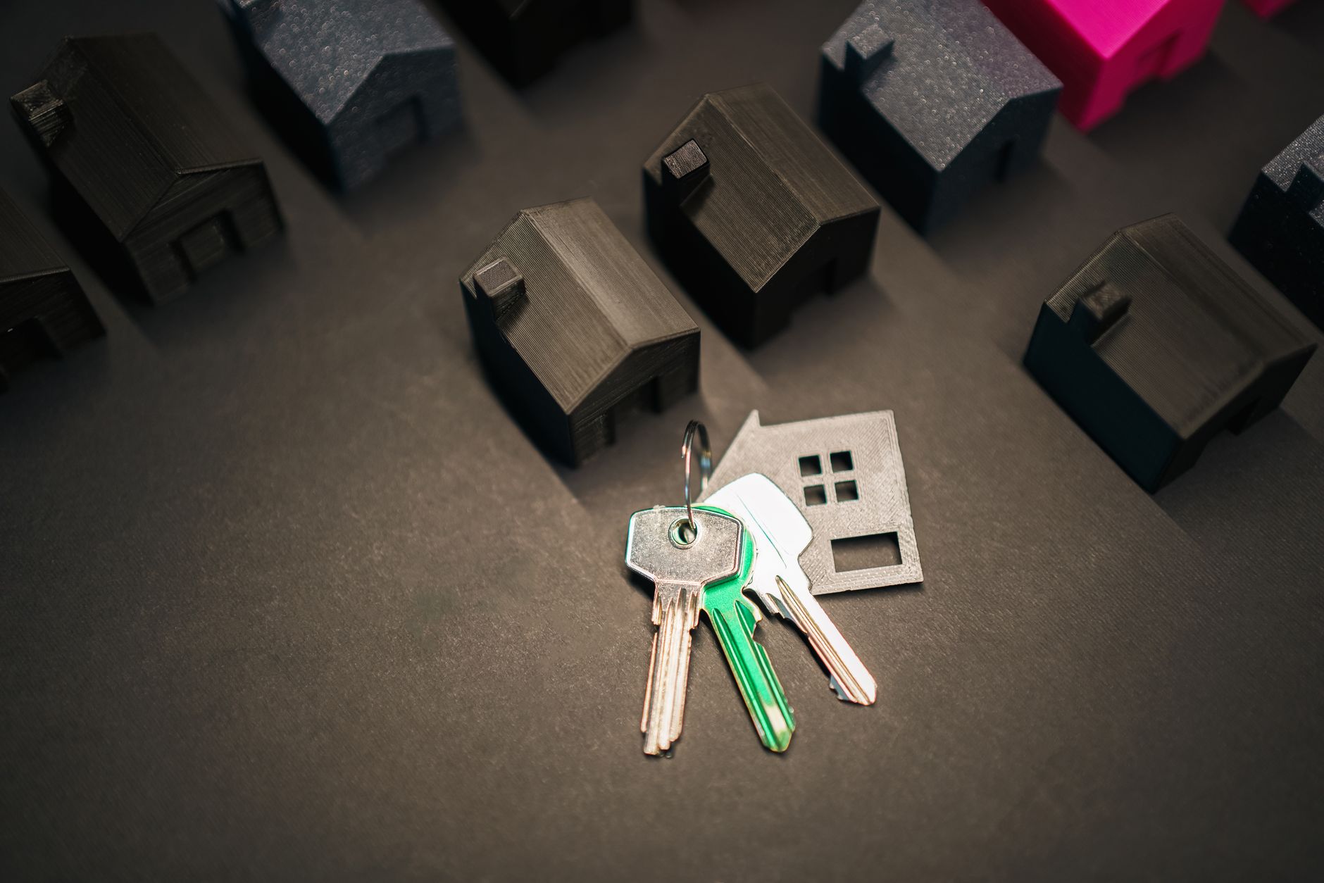 House keys resting on a table, illustrating a home mortgage and recasting