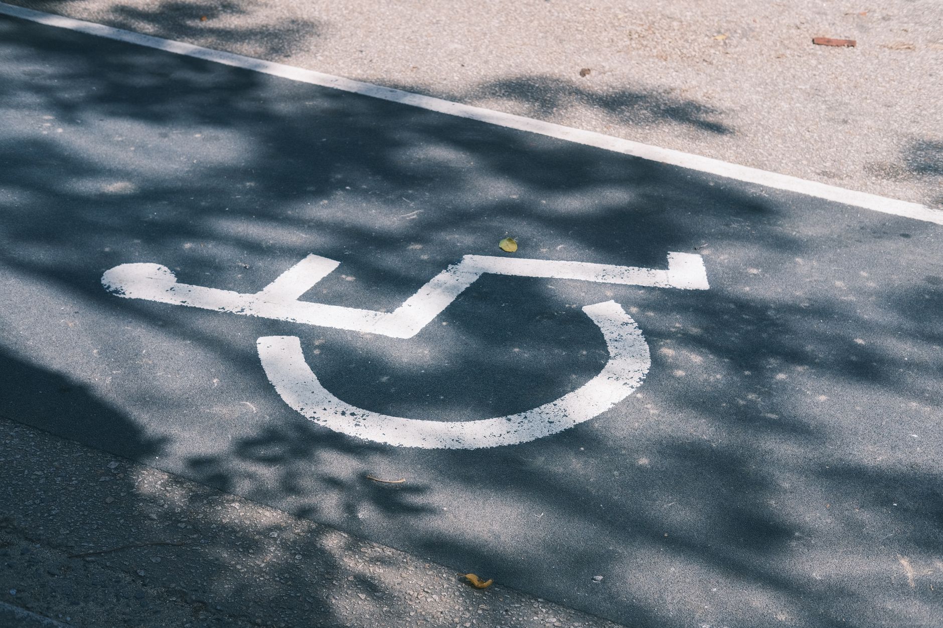 Person using a wheelchair managing personal finances