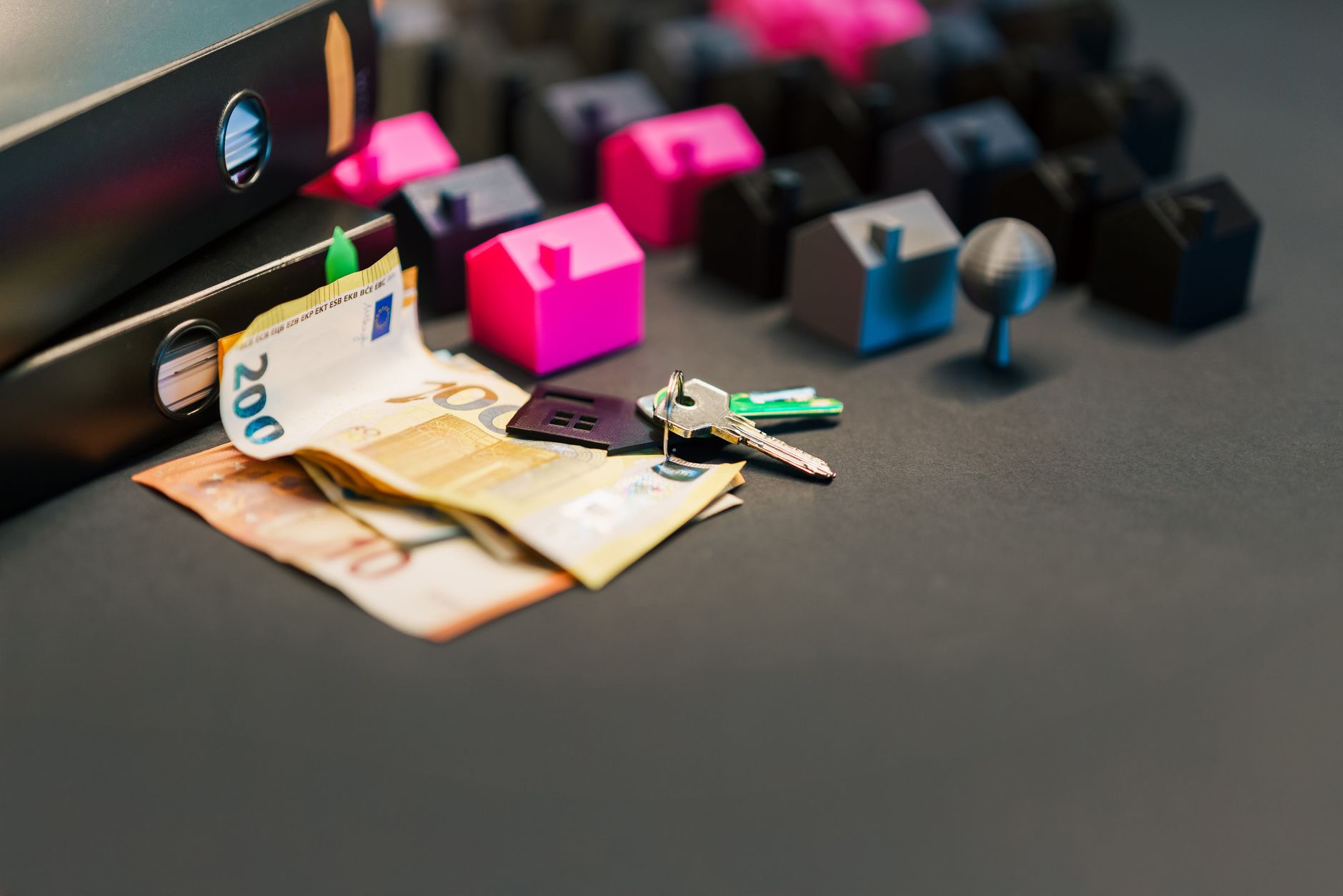 Car keys resting on insurance paperwork