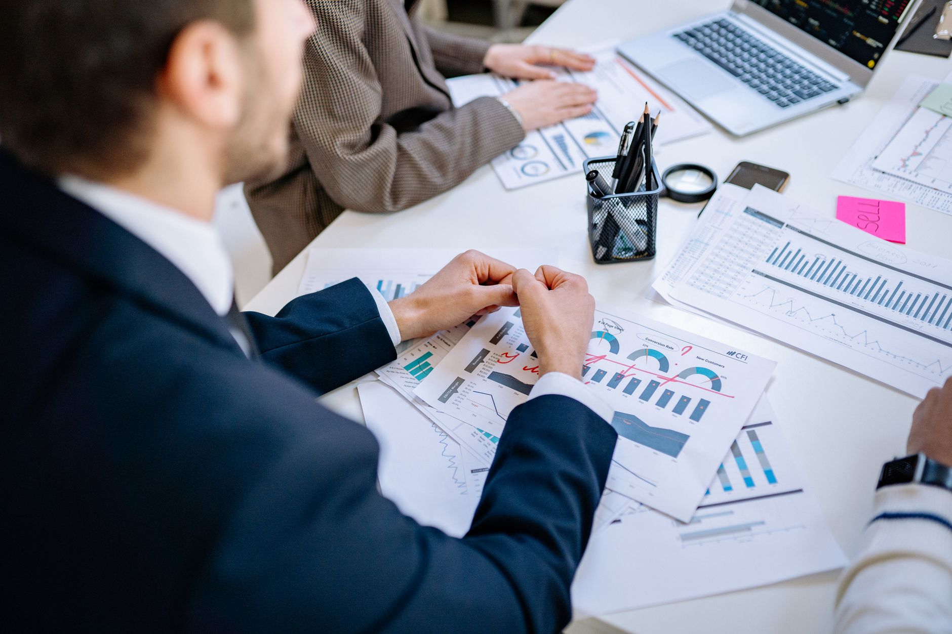 Employee reviewing stock performance on a screen, illustrating how an employee stock purchase plan works