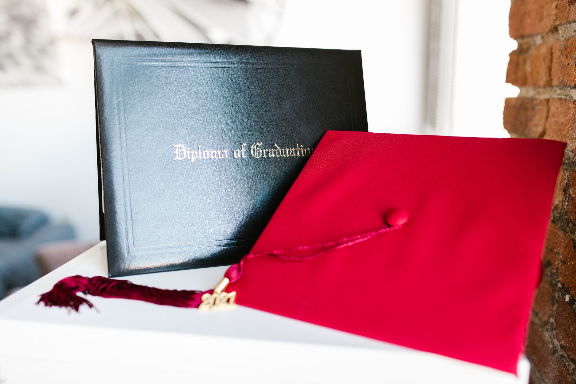 Graduate reviewing student loan repayment documents