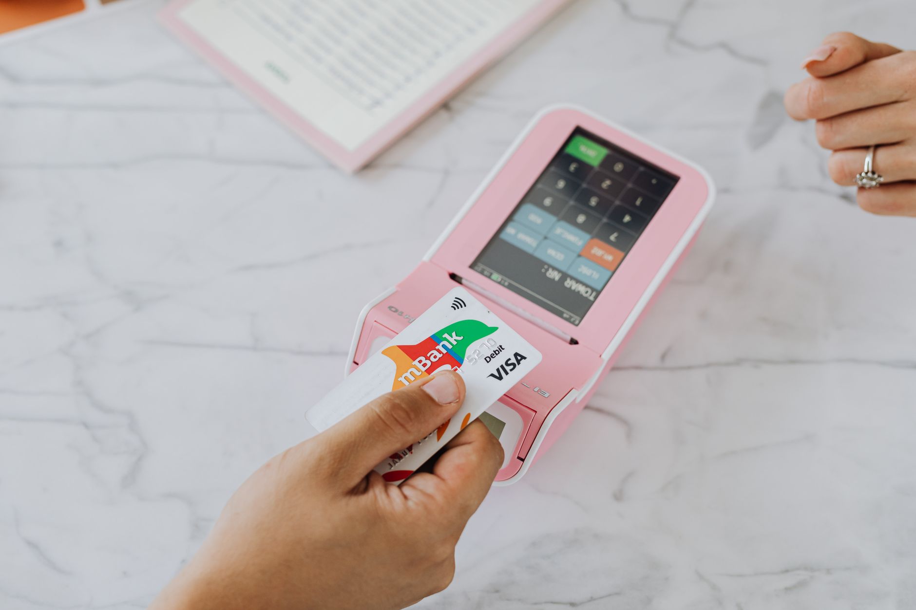 Prepaid payroll card being used at a payment terminal