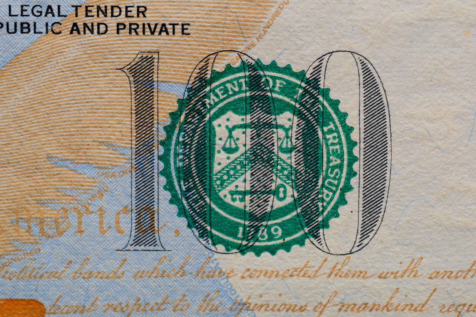 Close-up of a U.S. dollar bill showing the Treasury seal, illustrating how Treasury bills work